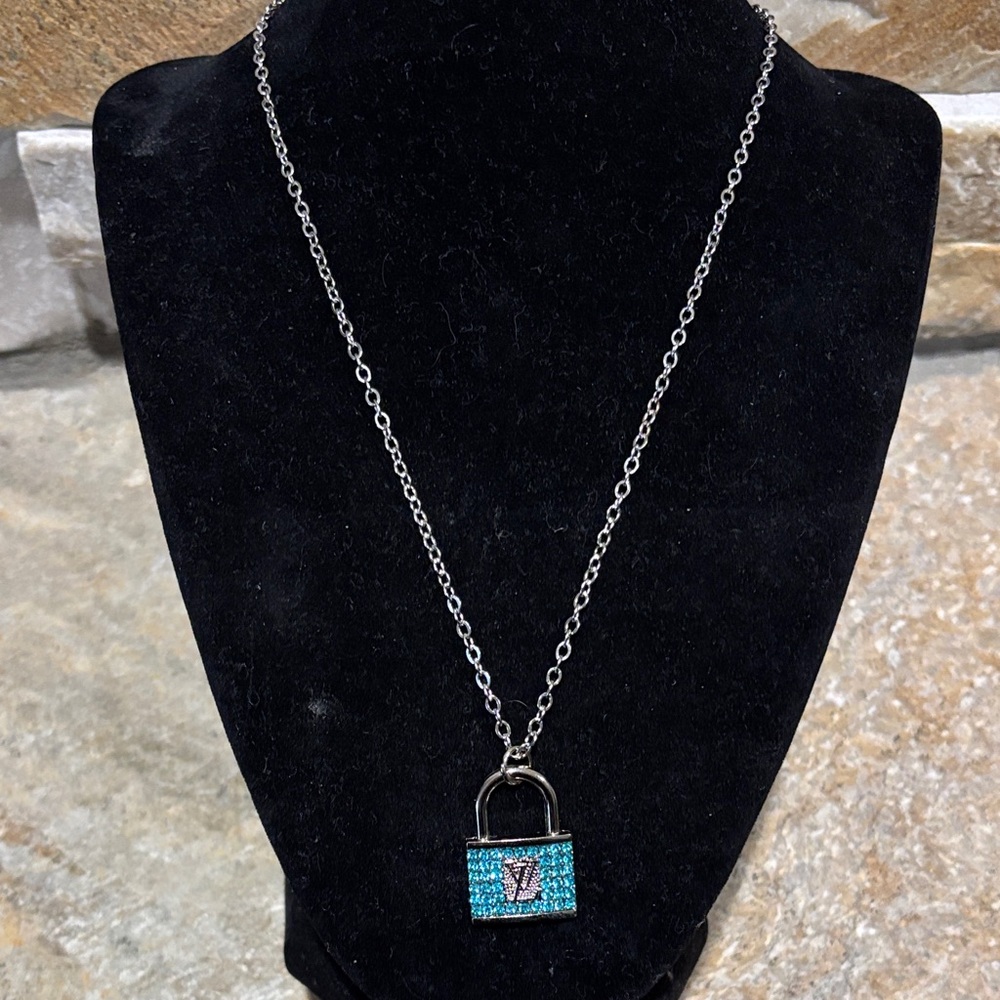 Elegant Silver Necklace with Blue LV lock Pendant